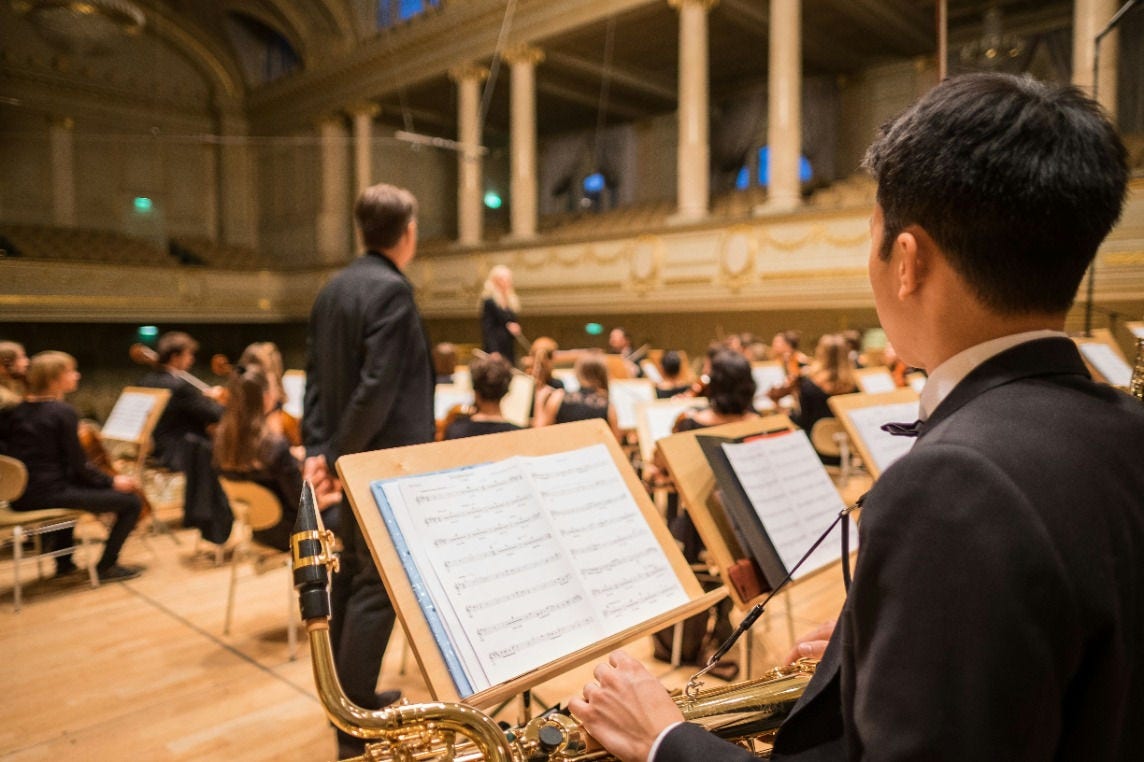 group of students in orchestra