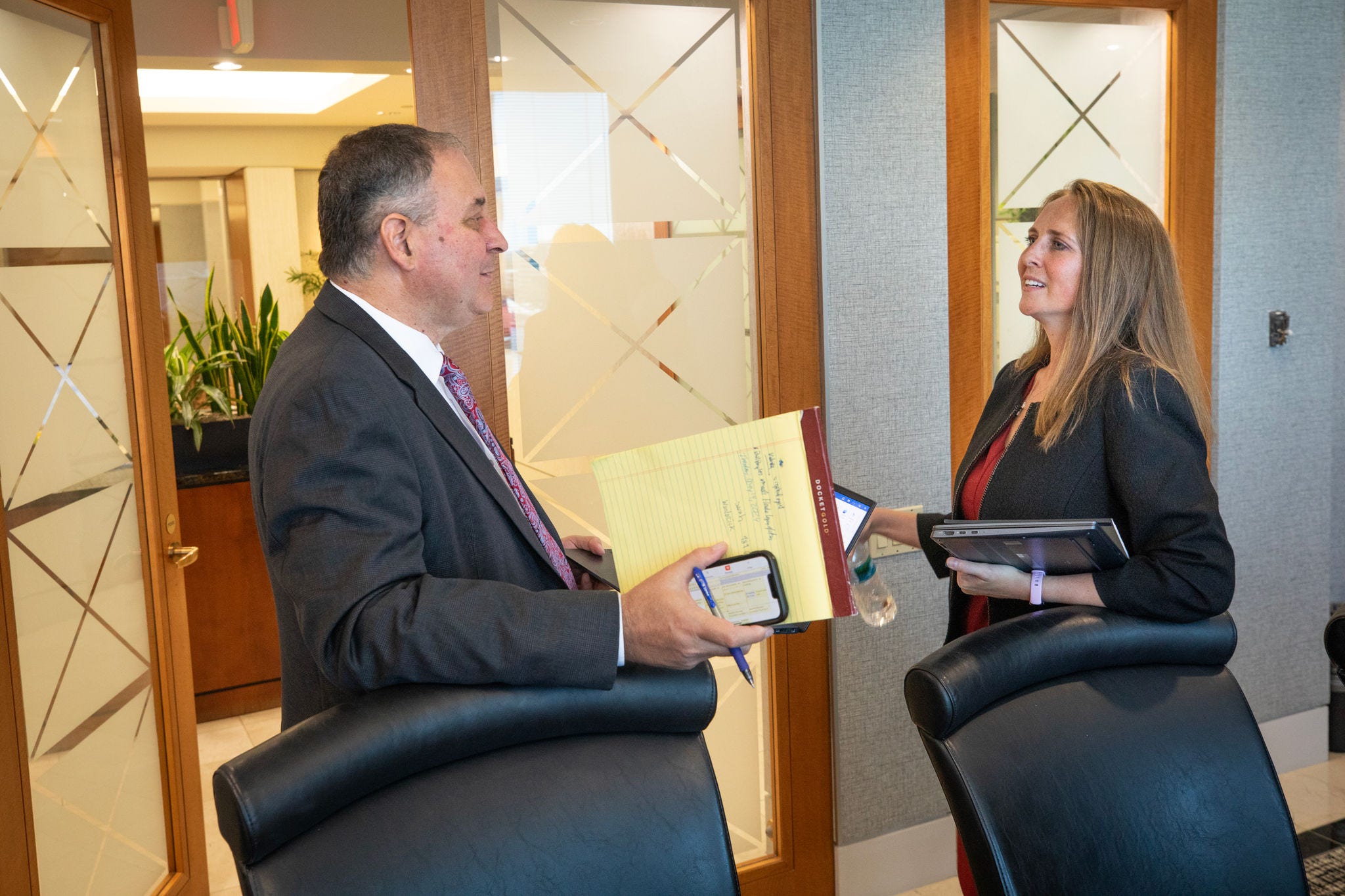 Jennifer Vanover, attorney with FLAG ministry. Jen talking with Tom McThenis on the way out the door. He is with the FLAG ministry also. 