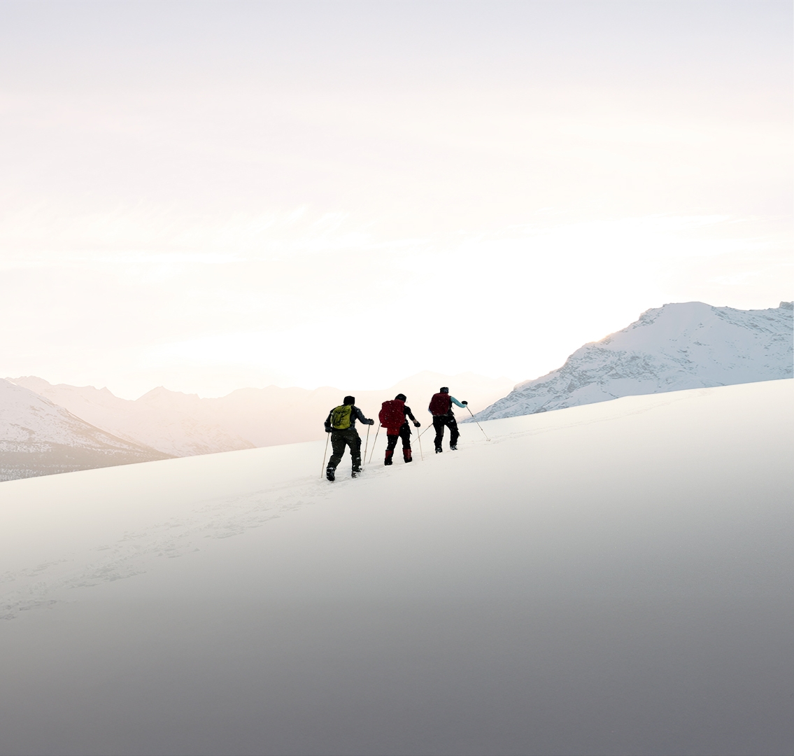 Silhoutte of people walking on mountain